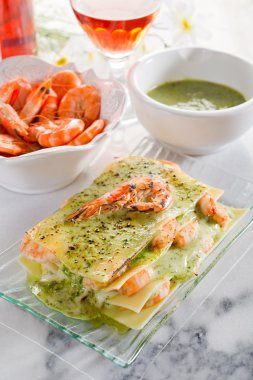 Lasagne with shrimp and pesto clipart