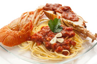 Spaghetti with lobster and tomato sauce clipart