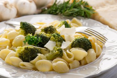 Orecchiette with broccoli on dish clipart