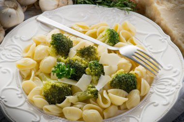 Orecchiette with broccoli on dish clipart