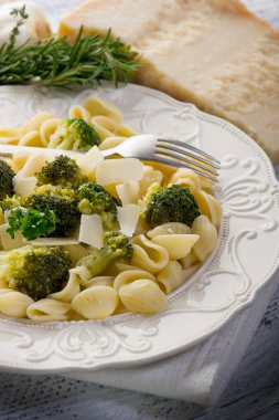 Orecchiette with broccoli on dish clipart