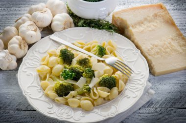 Orecchiette with broccoli on dish clipart