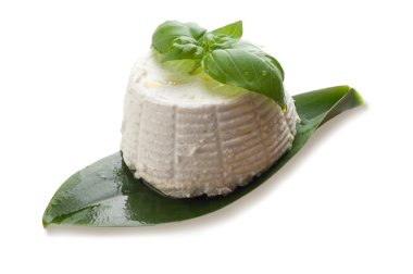 Ricotta and basil on white background clipart