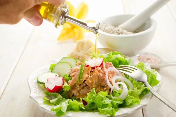 stock image Olive oil over tuna salad