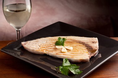 Grilled swordfish with garlic and parsely clipart