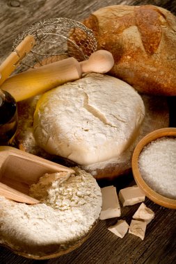 Dough and ingredients for homemade bread clipart