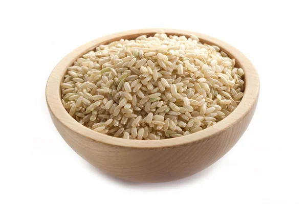 Celé rýže na bílém pozadí — Stock fotografie