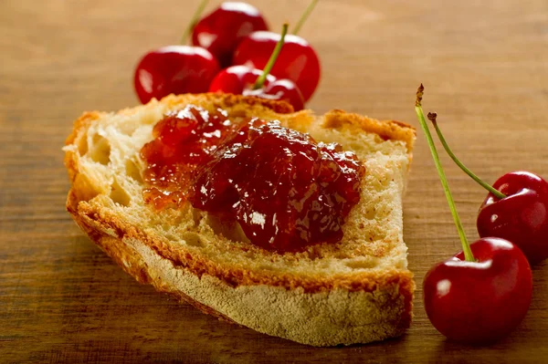 Cherry jam with slice bread — Stock Photo, Image