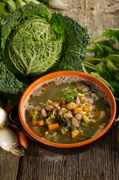 Warzywa do zupy na tle drewna — Zdjęcie stockowe