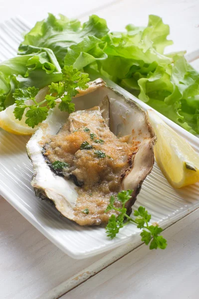 Oyster au gratin — стоковое фото