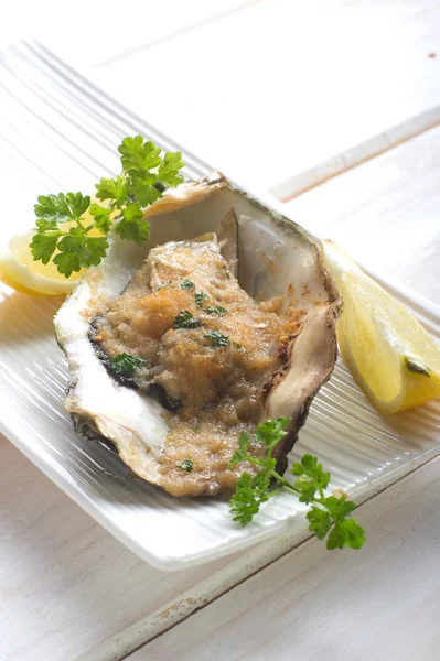 Oyster au gratin — стоковое фото