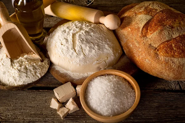 Dough and ingredients for homemade bread — Stock Photo, Image