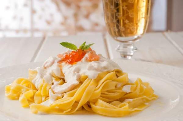 stock image Pasta with salmon and cream sauce