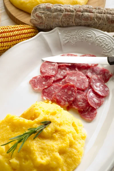 Polenta and salami — Stock Photo, Image