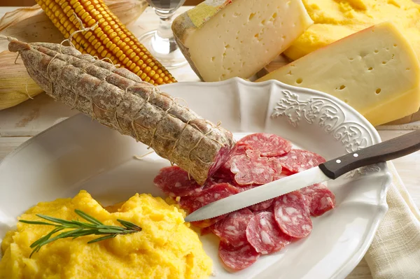 Polenta salami and cheese — Stock Photo, Image
