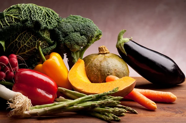 Mix vegetables over wood background — Stock Photo, Image