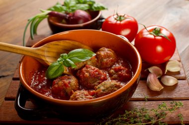 Meat balls with tomatoes sauce clipart