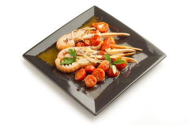 Norveç ıstakoz dilimlenmiş domates ile