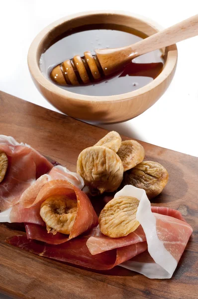 Italian appetizer with parma ham and dried figs — Stock Photo, Image