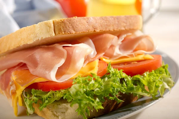 Sandwich with parma ham cheese and lettuce — Stock Photo, Image