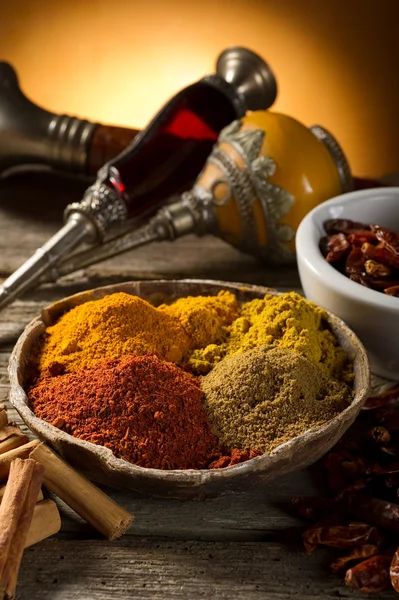 Variety of spice on wood background — Stock Photo, Image