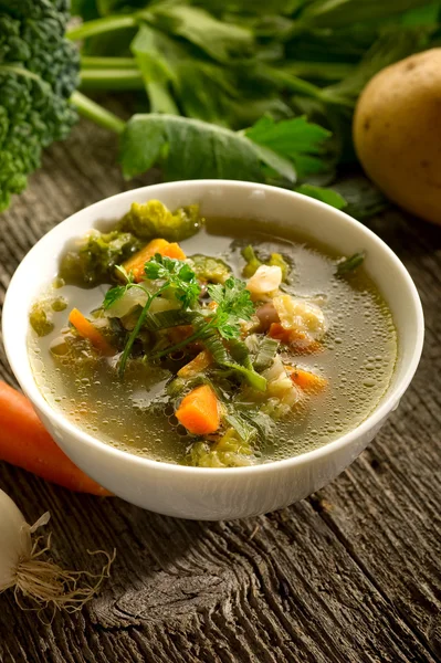 Soppa grönsaker på trä bakgrund — Stockfoto