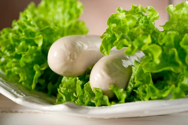 Wurstel with green salad — Stock Photo, Image