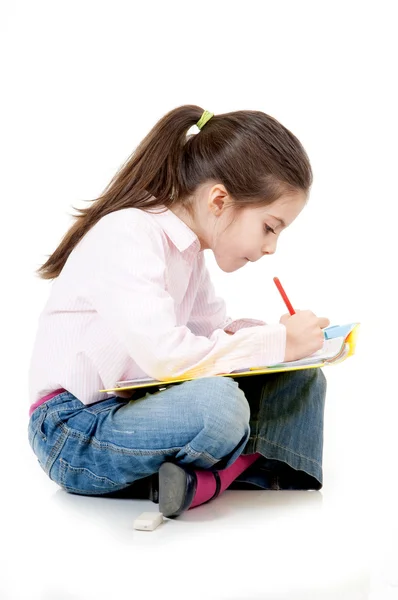 Маленька дівчинка studyng — стокове фото
