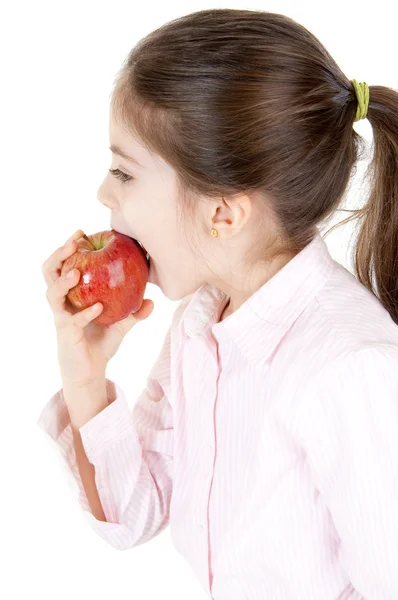Little girl eating apple — Stock Photo, Image