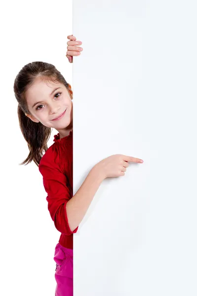Menina apontando fingher em segurando placa vazia — Fotografia de Stock