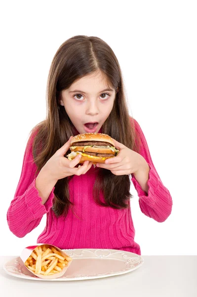 Niña comiendo hamburguesa —  Fotos de Stock