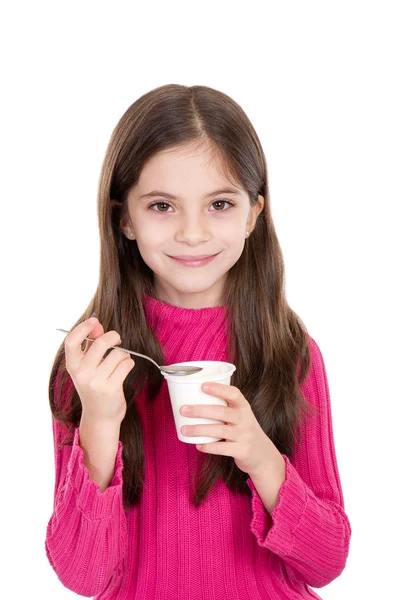 Κοριτσάκι που τρώει γιαούρτι — Φωτογραφία Αρχείου