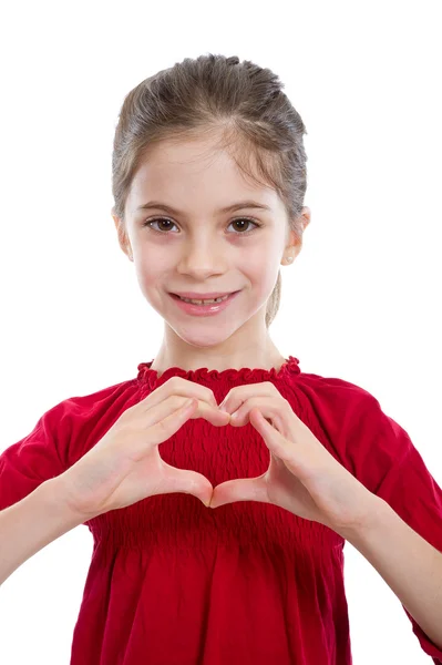 Kleines Mädchen macht eine Geste in Form des Herzens. — Stockfoto