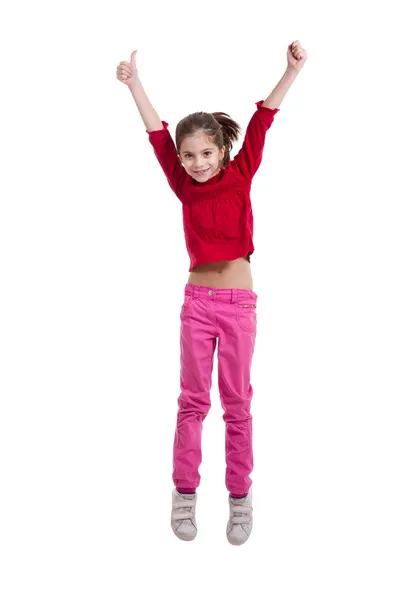 Klein meisje springen op witte achtergrond — Stockfoto
