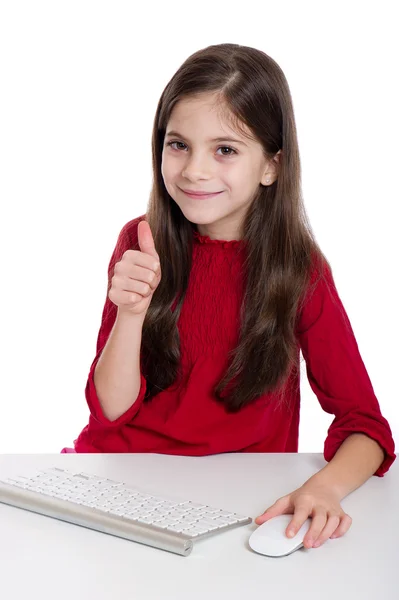 Little girl thumb up with Pc keyboard and mouse — Stock Photo, Image