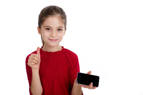 Маленька дівчинка зі смартфоном — стокове фото