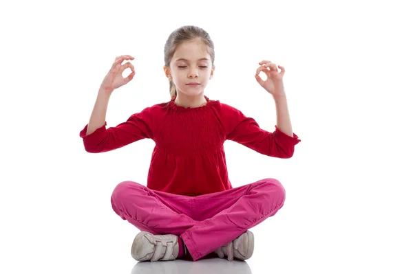 Young girl in relaxed yoga pose — Stock Photo, Image
