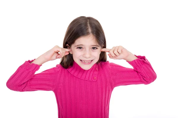 Девушка кладет палец на уши — стоковое фото