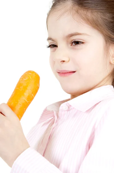 Petite fille manger carotte — Photo