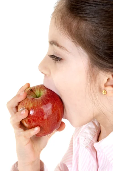 Mała dziewczynka je jabłko — Zdjęcie stockowe