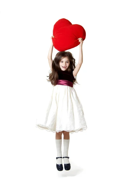 Little girl with red heart — Stock Photo, Image