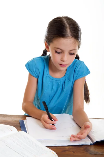 Mała dziewczynka studiuje — Zdjęcie stockowe