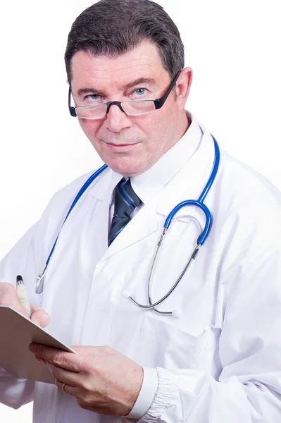 Doctor at work writing — Stock Photo, Image