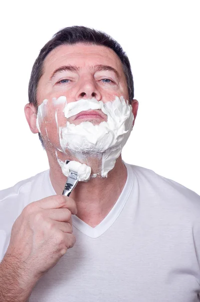 stock image Man shaving beard