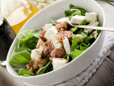 Mixed salad with fresh spinach tuna and feta cheese clipart