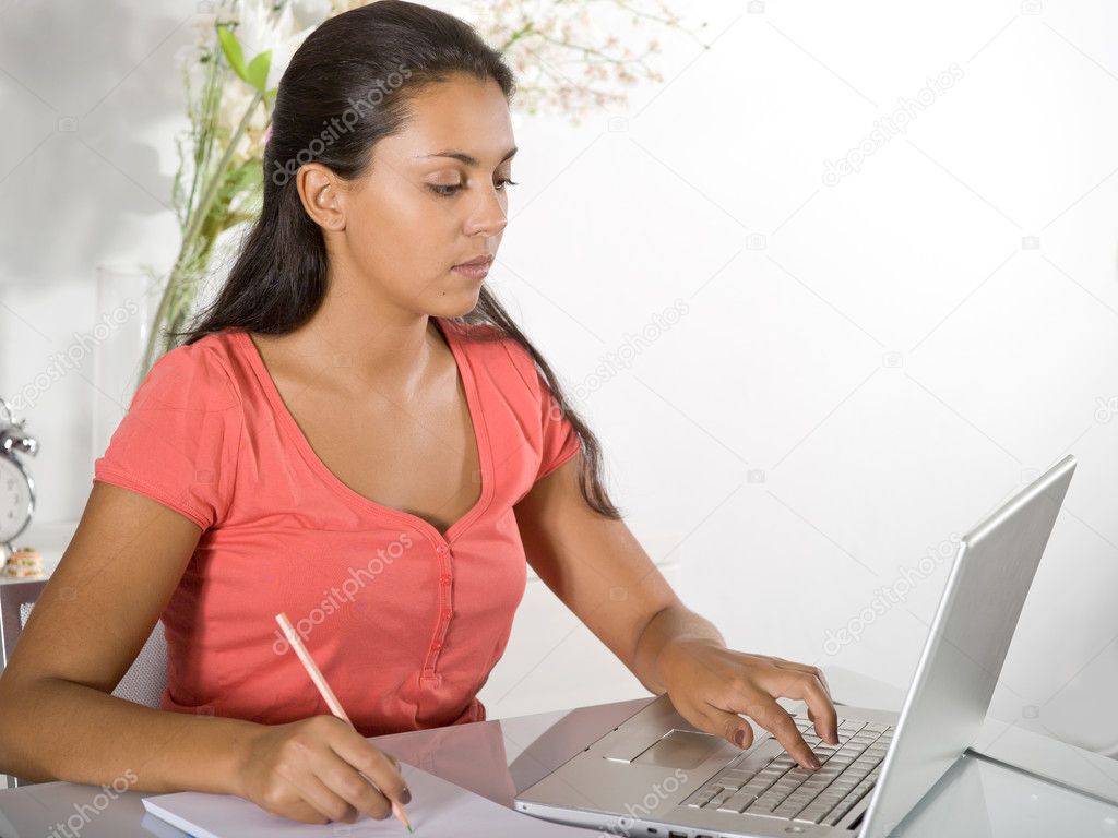 Girl with laptop at home