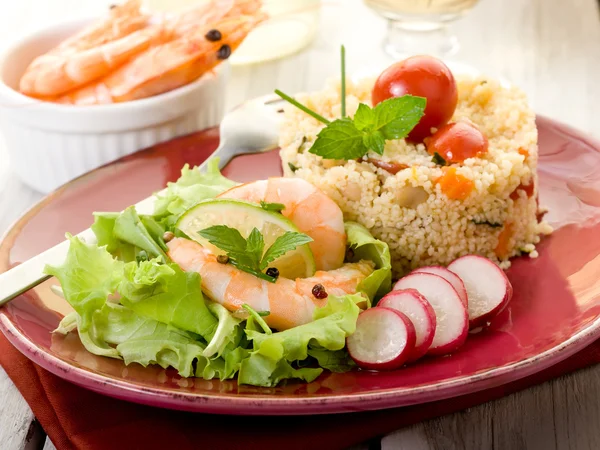 Shrimp with lettuce and vegetables couscous — Stock Photo, Image