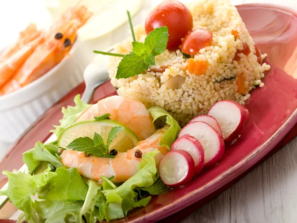 Shrimp with salad and vegetables couscous — Stock Photo, Image