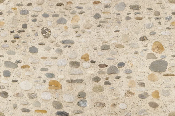 Çakıl taşları temizlemek ve kum duvar dokusu temizleyin — Stok fotoğraf