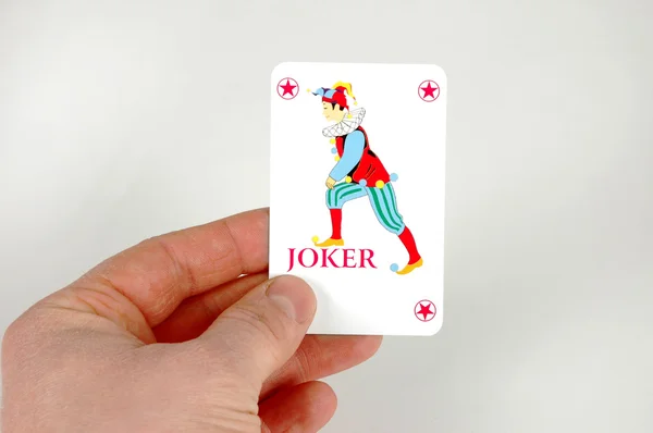 Joker in mano — Foto Stock